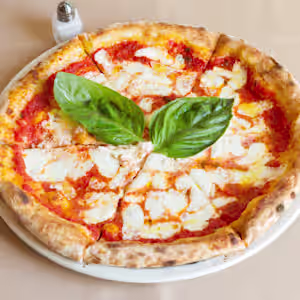 Trattoria Zooma signature dishes Margherita Verace PizzaGnocchi SorrentinaTagliatelle Bolognese